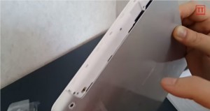 The V919 Air 3G's sim and microsd card slots are hidden behind this flimsy cover.